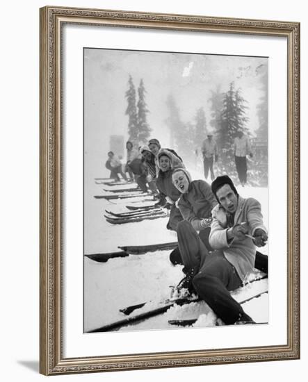 People Playing Tug of War During Snowstorm at Timberline Lodge Ski Club Party-Ralph Morse-Framed Photographic Print