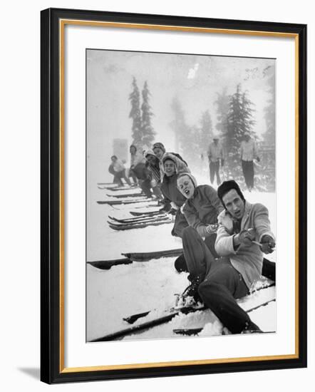 People Playing Tug of War During Snowstorm at Timberline Lodge Ski Club Party-Ralph Morse-Framed Photographic Print