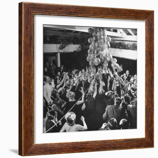 People Reaching For the Balloons at the Palm Beach Party-Herbert Gehr-Framed Photographic Print