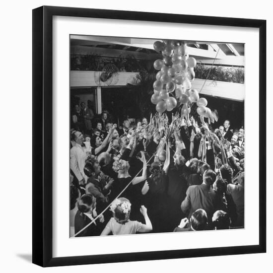 People Reaching For the Balloons at the Palm Beach Party-Herbert Gehr-Framed Photographic Print