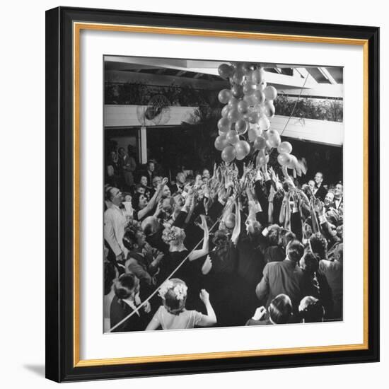 People Reaching For the Balloons at the Palm Beach Party-Herbert Gehr-Framed Photographic Print