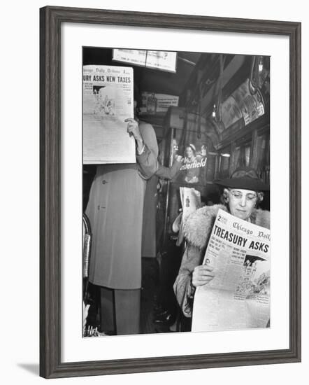 People Reading Tribune Newspaper on Train-William C^ Shrout-Framed Photographic Print