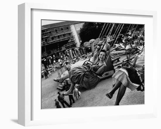 People Riding a Merry Go Round, During the Celebration of Munich's 800th Anniversary-Michael Rougier-Framed Photographic Print