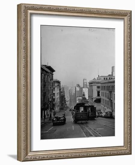 People Riding on Dual Cable Cars, with Bay Bridge Sitting in Background-Charles E^ Steinheimer-Framed Photographic Print
