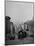 People Riding on Dual Cable Cars, with Bay Bridge Sitting in Background-Charles E^ Steinheimer-Mounted Photographic Print