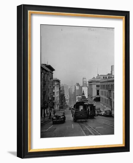 People Riding on Dual Cable Cars, with Bay Bridge Sitting in Background-Charles E^ Steinheimer-Framed Photographic Print