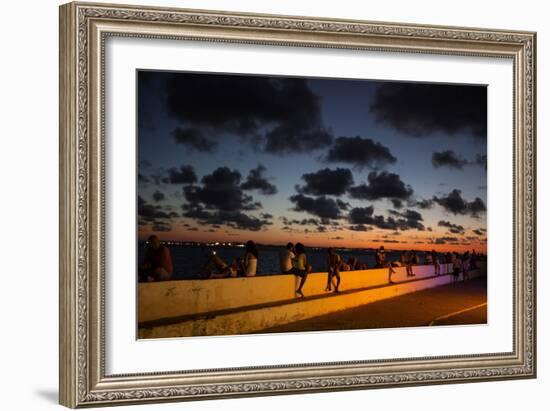 People Sitting on a Wall in Salvador at Dusk-Alex Saberi-Framed Photographic Print