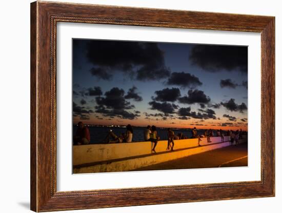 People Sitting on a Wall in Salvador at Dusk-Alex Saberi-Framed Photographic Print