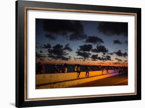 People Sitting on a Wall in Salvador at Dusk-Alex Saberi-Framed Photographic Print