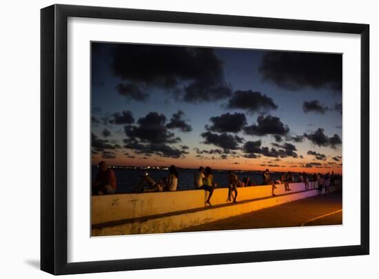 People Sitting on a Wall in Salvador at Dusk-Alex Saberi-Framed Photographic Print