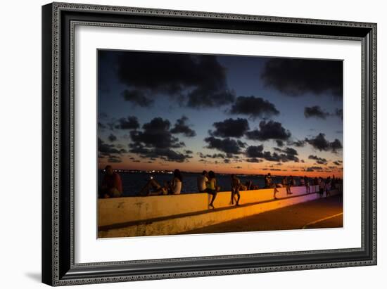 People Sitting on a Wall in Salvador at Dusk-Alex Saberi-Framed Photographic Print