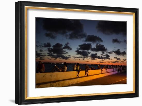 People Sitting on a Wall in Salvador at Dusk-Alex Saberi-Framed Photographic Print