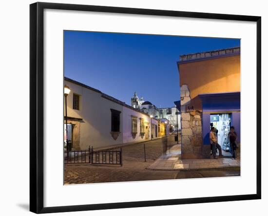 People Stood in Shop Doorway at Dusk, Oaxaca, Oaxaca State, Mexico-Peter Adams-Framed Photographic Print