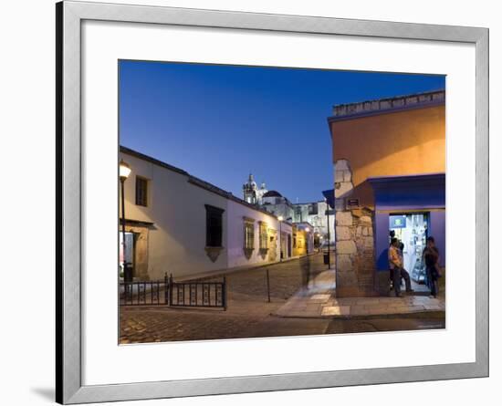 People Stood in Shop Doorway at Dusk, Oaxaca, Oaxaca State, Mexico-Peter Adams-Framed Photographic Print