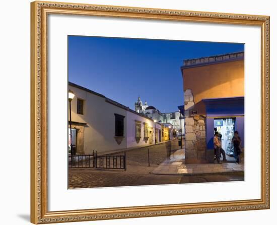 People Stood in Shop Doorway at Dusk, Oaxaca, Oaxaca State, Mexico-Peter Adams-Framed Photographic Print