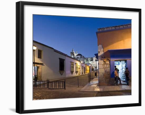 People Stood in Shop Doorway at Dusk, Oaxaca, Oaxaca State, Mexico-Peter Adams-Framed Photographic Print