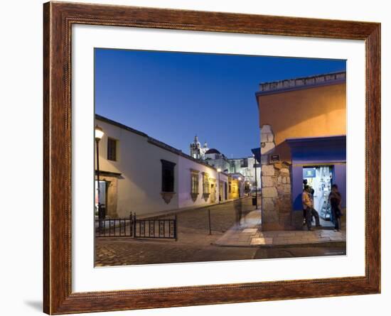 People Stood in Shop Doorway at Dusk, Oaxaca, Oaxaca State, Mexico-Peter Adams-Framed Photographic Print