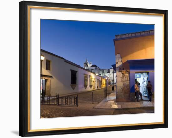 People Stood in Shop Doorway at Dusk, Oaxaca, Oaxaca State, Mexico-Peter Adams-Framed Photographic Print