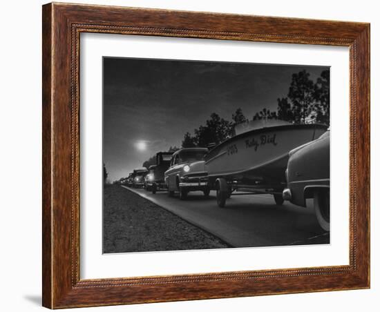 People Towing their Boats after Motor Boating Throughout the Day-null-Framed Photographic Print