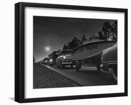 People Towing their Boats after Motor Boating Throughout the Day-null-Framed Photographic Print