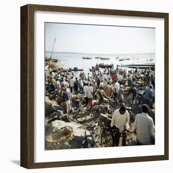 People Waiting on Beach for Dhows to Land Fish, Stone Town, Zanzibar, Tanzania, East Africa, Africa-Lee Frost-Framed Photographic Print