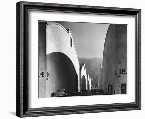 People Walking Between Sound Stages at Warner Brothers Studio-Margaret Bourke-White-Framed Photographic Print