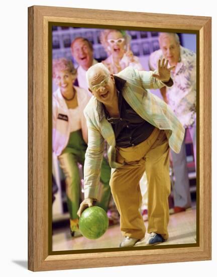 People Watching a Senior Man Bowling at a Bowling Alley-null-Framed Premier Image Canvas