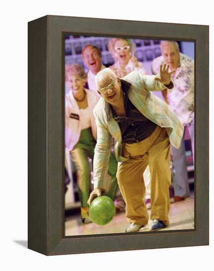 People Watching a Senior Man Bowling at a Bowling Alley-null-Framed Premier Image Canvas