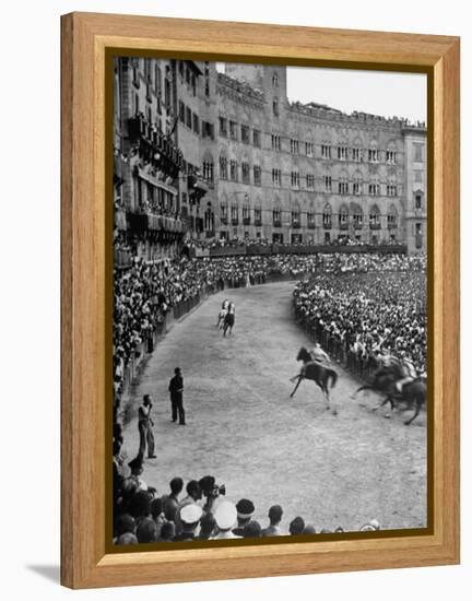 People Watching Horse Race that Is Traditional Part of the Palio Celebration-Walter Sanders-Framed Premier Image Canvas