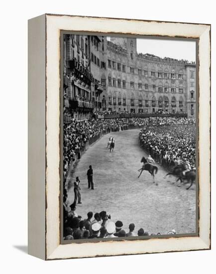 People Watching Horse Race that Is Traditional Part of the Palio Celebration-Walter Sanders-Framed Premier Image Canvas