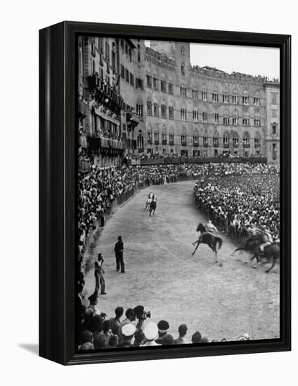People Watching Horse Race that Is Traditional Part of the Palio Celebration-Walter Sanders-Framed Premier Image Canvas