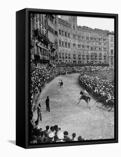 People Watching Horse Race that Is Traditional Part of the Palio Celebration-Walter Sanders-Framed Premier Image Canvas