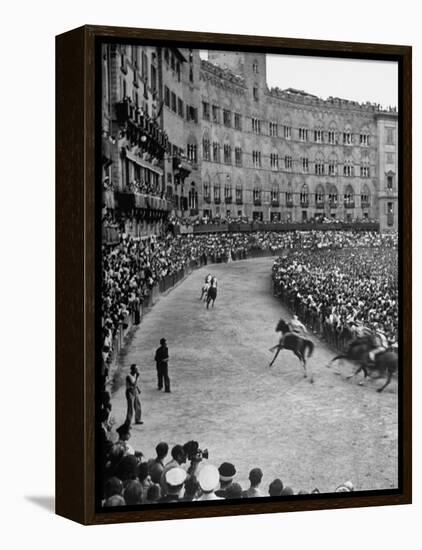 People Watching Horse Race that Is Traditional Part of the Palio Celebration-Walter Sanders-Framed Premier Image Canvas