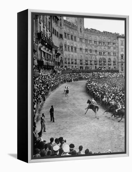 People Watching Horse Race that Is Traditional Part of the Palio Celebration-Walter Sanders-Framed Premier Image Canvas