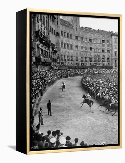 People Watching Horse Race that Is Traditional Part of the Palio Celebration-Walter Sanders-Framed Premier Image Canvas