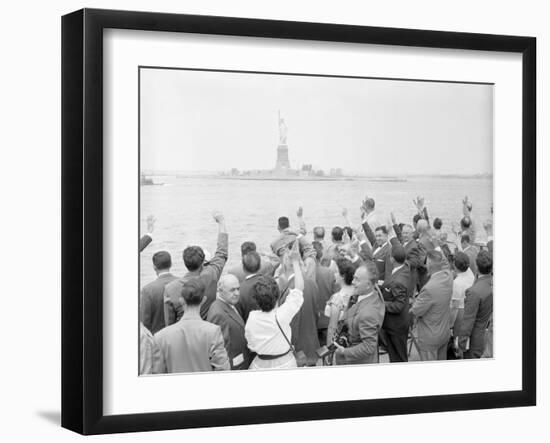 People Waving to the Statue of Liberty-null-Framed Photographic Print