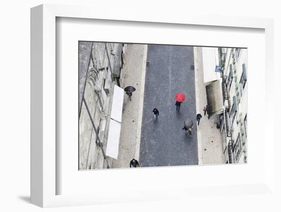 People with Colourful Umbrellas, Vertical View from the Elevador De Santa Justa, Lisbon-Axel Schmies-Framed Photographic Print