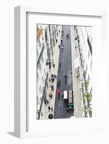 People with Colourful Umbrellas, Vertical View from the Elevador De Santa Justa, Lisbon-Axel Schmies-Framed Photographic Print