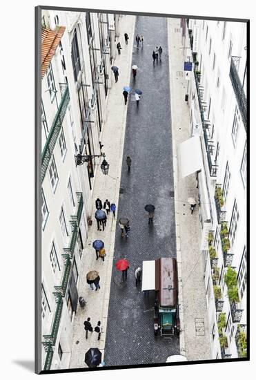 People with Colourful Umbrellas, Vertical View from the Elevador De Santa Justa, Lisbon-Axel Schmies-Mounted Photographic Print