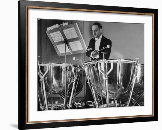 Percussionist Saul Goodman Playing the Tympani in the New York Philharmonic-Margaret Bourke-White-Framed Photographic Print