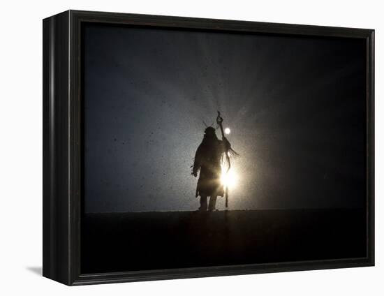 Performer is Silhouetted at the Opening Ceremonies for the XXI Olympic Winter Games in Vancouver-null-Framed Premier Image Canvas