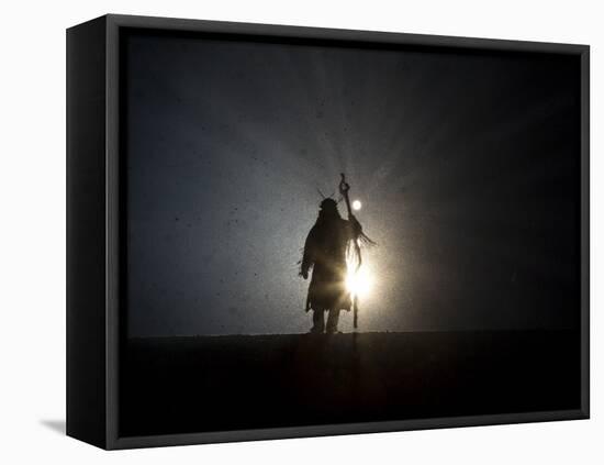 Performer is Silhouetted at the Opening Ceremonies for the XXI Olympic Winter Games in Vancouver-null-Framed Premier Image Canvas