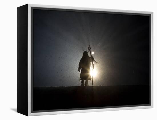 Performer is Silhouetted at the Opening Ceremonies for the XXI Olympic Winter Games in Vancouver-null-Framed Premier Image Canvas