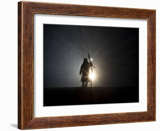 Performer is Silhouetted at the Opening Ceremonies for the XXI Olympic Winter Games in Vancouver-null-Framed Photographic Print