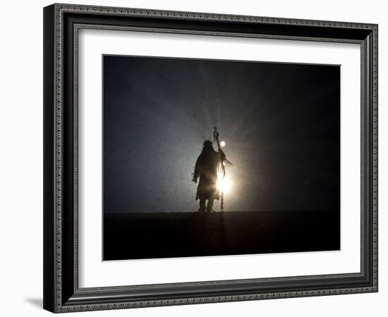 Performer is Silhouetted at the Opening Ceremonies for the XXI Olympic Winter Games in Vancouver-null-Framed Photographic Print