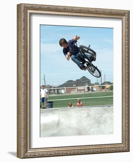 Performing a Bicycle Stunt-null-Framed Photographic Print