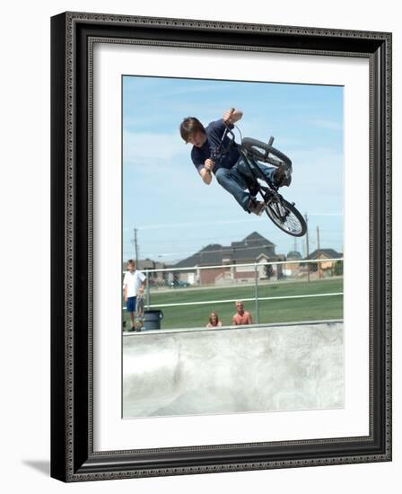 Performing a Bicycle Stunt-null-Framed Photographic Print