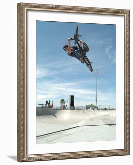Performing a Bicycle Stunt-null-Framed Photographic Print