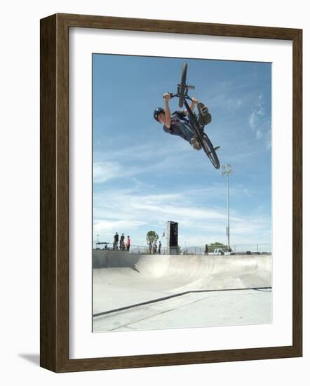 Performing a Bicycle Stunt-null-Framed Photographic Print