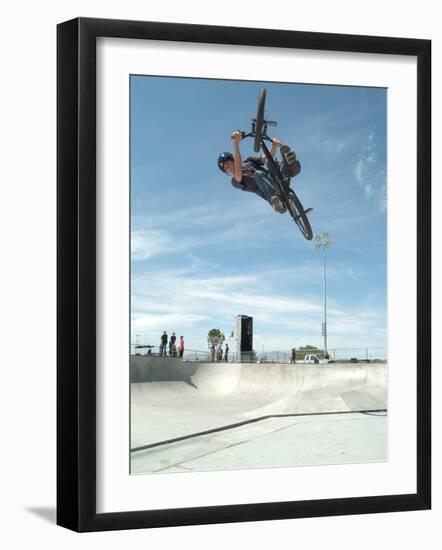 Performing a Bicycle Stunt-null-Framed Photographic Print